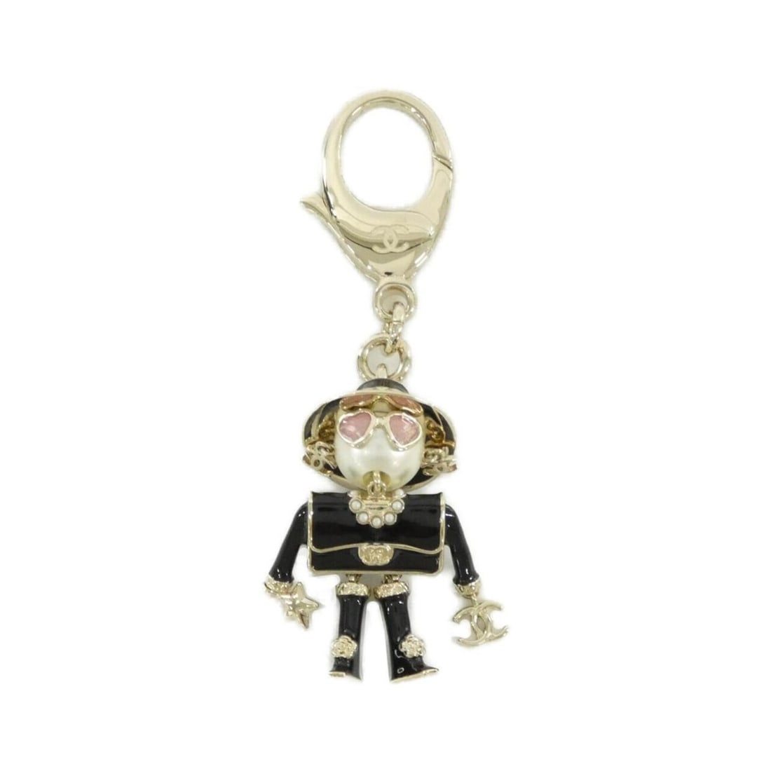 Chanel ABG014 Keychain: --- Catalog ---Category: DesignType: KeyringColor: Black, Pink, WhiteGender: WomenCategory: GeneralMPN: ABG014Brand: Chanel--- Item List ---Section: ConditionRanking: Rank A Used - A few traces of