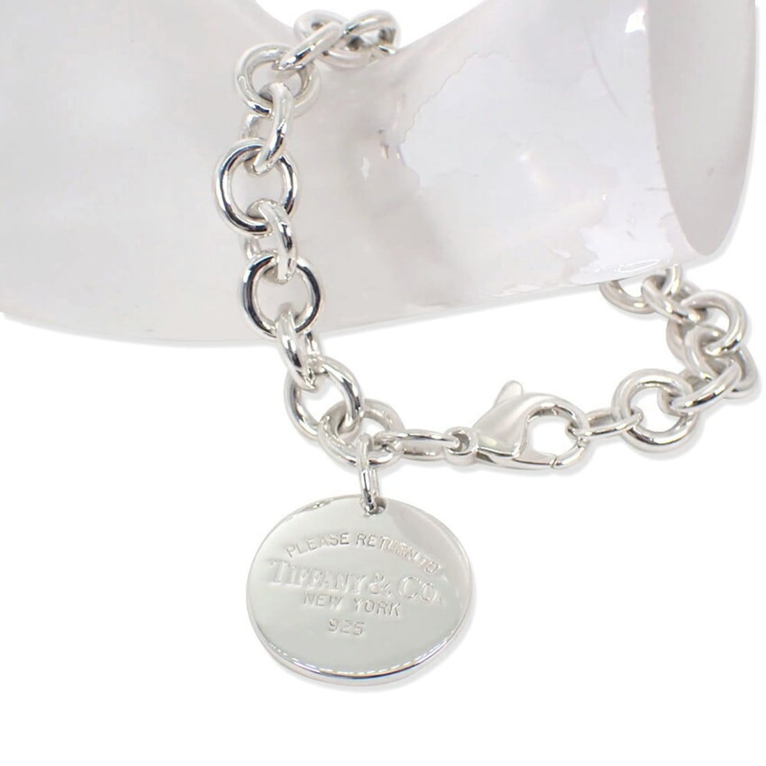 TIFFANY & Co. 925 Return to Round Tag Bracelet: --- Catalog ---Category: SizeLength: 19cm / 7.48''Category: DesignType: Charm braceletGender: WomenMaterial: Sterling silver 925Category: GeneralBrand: Tiffany--- Item List ---Section: