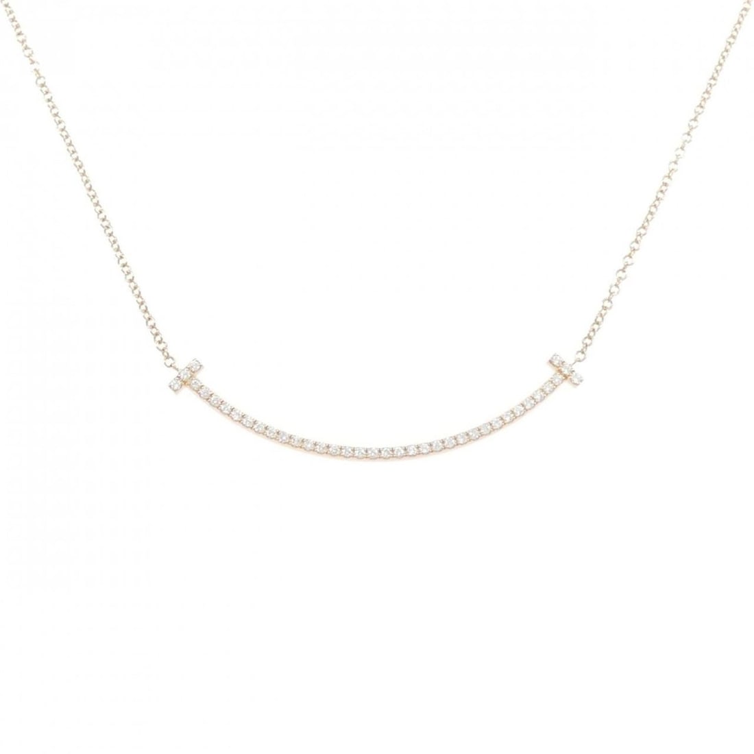 Tiffany T Smile Small Necklace: --- Catalog ---Category: SizePendant Size: 3.6mm x 36.9mm / 0.14'' x 1.45''Neck Circumference: 41 cm / 16.14''Category: DesignStone: DiamondGender: WomenMaterial: Pink gold (18K)Pendant Type: