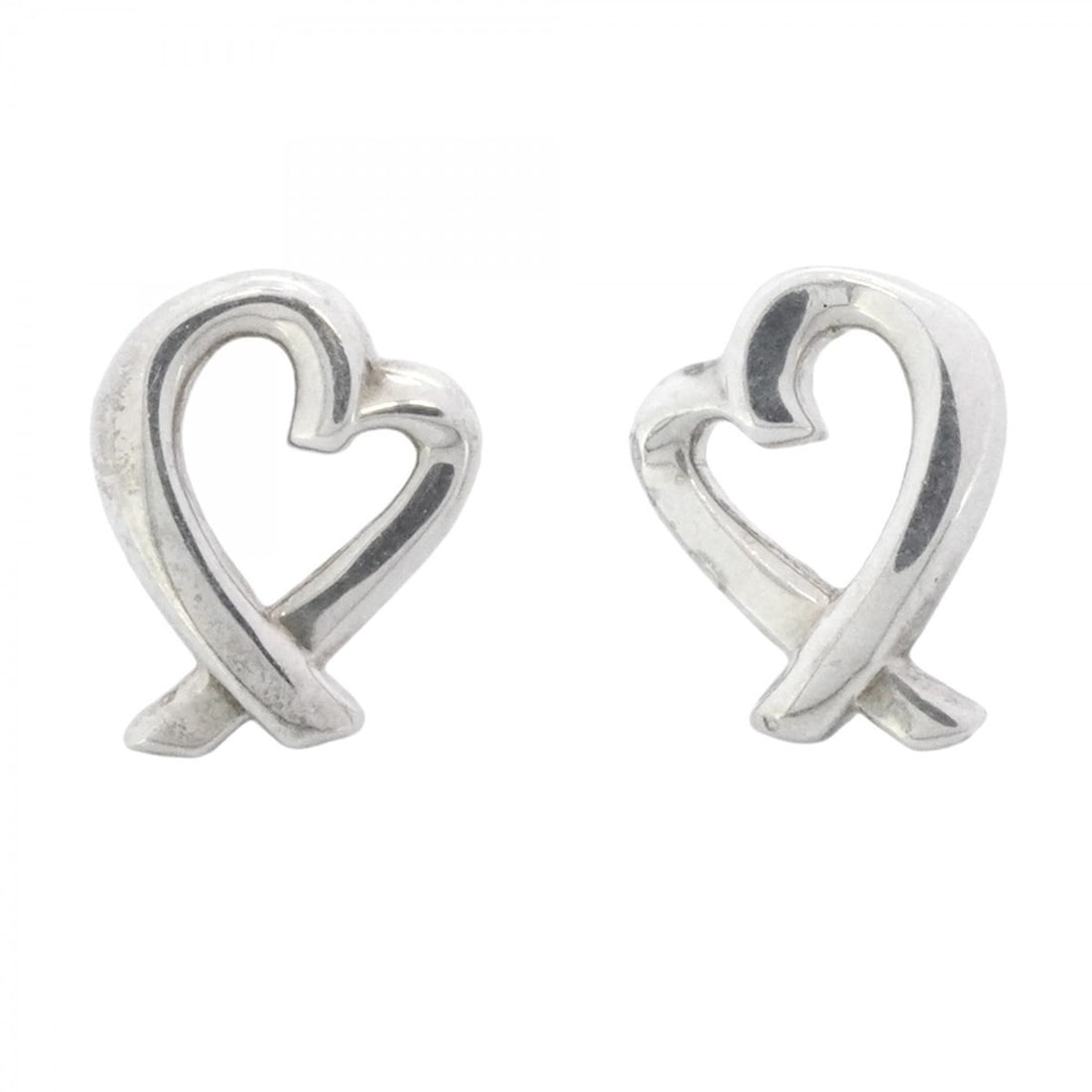 Tiffany & Co. Loving Heart Sterling Silver Earrings for Women: --- Catalog ---Category: SizeSize (HxWxD): 10.40mm x 8.00mm / 0.41'' x 0.31''Category: DesignType: Stud earringsGender: WomenMaterial: Silver 925Category: GeneralBrand: Tiffany--- Item List