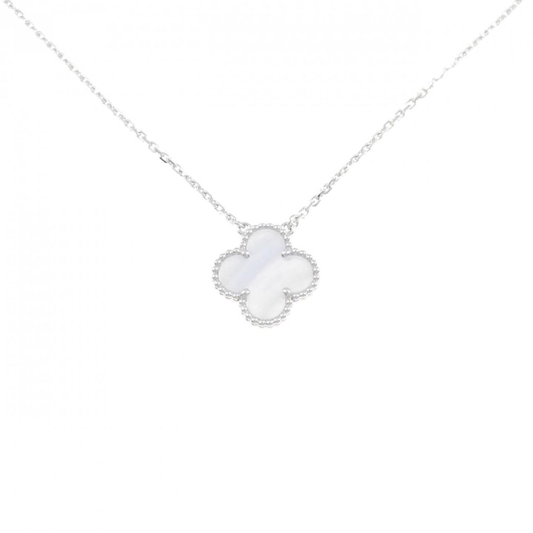 Van Cleef & Arpels Vintage Alhambra Necklace: --- Catalog ---Category: SizePendant Size: 14.8mm x 14.8mm / 0.58'' x 0.58''Neck Circumference: 37 cm - 42 cm / 14.56'' - 16.53''Category: DesignColor: White goldStone: ChalcedonyGender: