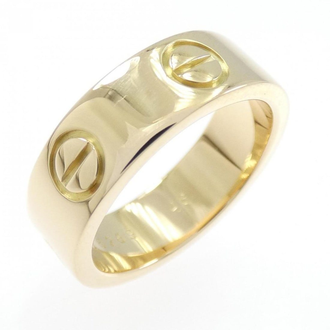Cartier Love Ring: --- Catalog ---Category: SizeUS Size: 4.5Brand Size: 48Category: DesignType: Band ringGender: WomenMaterial: Yellow gold (18K)Category: GeneralBrand: Cartier--- Item List ---Section: ConditionRanking: