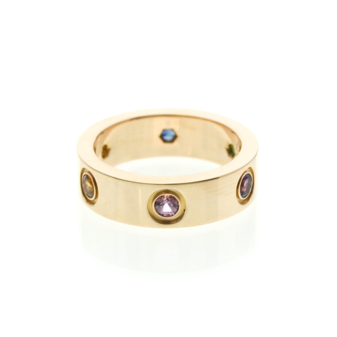 Cartier Love Ring Multistone Pink Gold (18K) Fashion Amethyst,Garnet,Sapphire Band Ring Pink Gold: --- Catalog ---Category: SizeWidth: 5.6mm / 0.22''Weight: 9.1g / 0.32oz.JP Size: 11US Size: 5 3/4Brand Size: 51Category: DesignType: Band ringColor: Pink goldMetal: GoldStone: Amethyst, Garnet, Sapphi