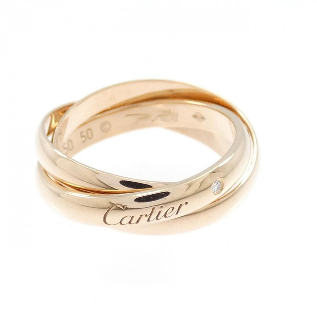 Cartier Trinity 2009 Christmas Limited Edition Ring: --- Catalog ---Category: SizeUS Size: 5.5Brand Size: 50Category: DesignType: Band ringStone: DiamondGender: WomenMaterial: Pink gold (18K)Category: GeneralMPN: B488400Brand: Cartier--- Item List ---Se