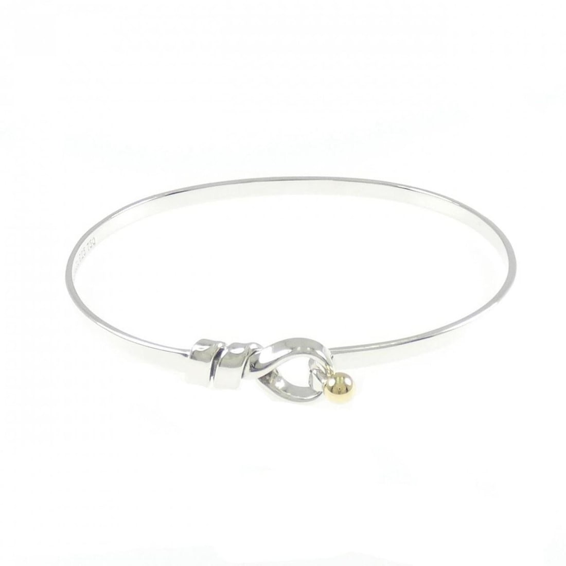 Tiffany Hook & Eye Bangle: --- Catalog ---Category: SizeLength: 17cm / 6.69''Category: DesignType: BangleColor: SilverGender: WomenMaterial: Silver 925, Yellow gold (18K)Category: GeneralBrand: Tiffany--- Item List ---Section: 