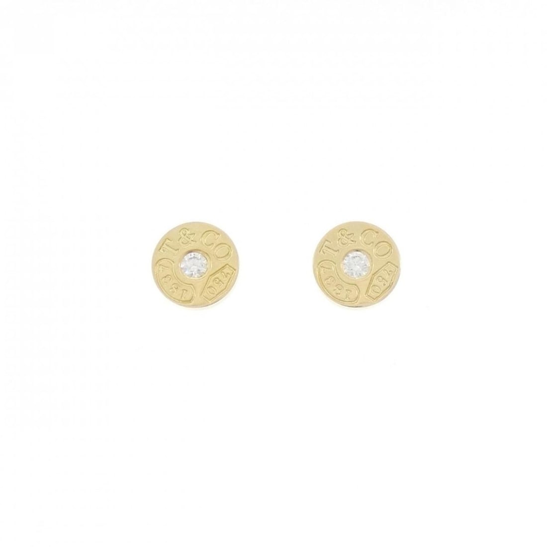 Tiffany & Co. 1837 Circle Earrings: --- Catalog ---Category: SizeSize (HxWxD): 8.10mm x 8.10mm / 0.32'' x 0.32''Category: DesignType: Stud earringsColor: Yellow goldStone: DiamondGender: WomenMaterial: Yellow gold (18K)Category: General