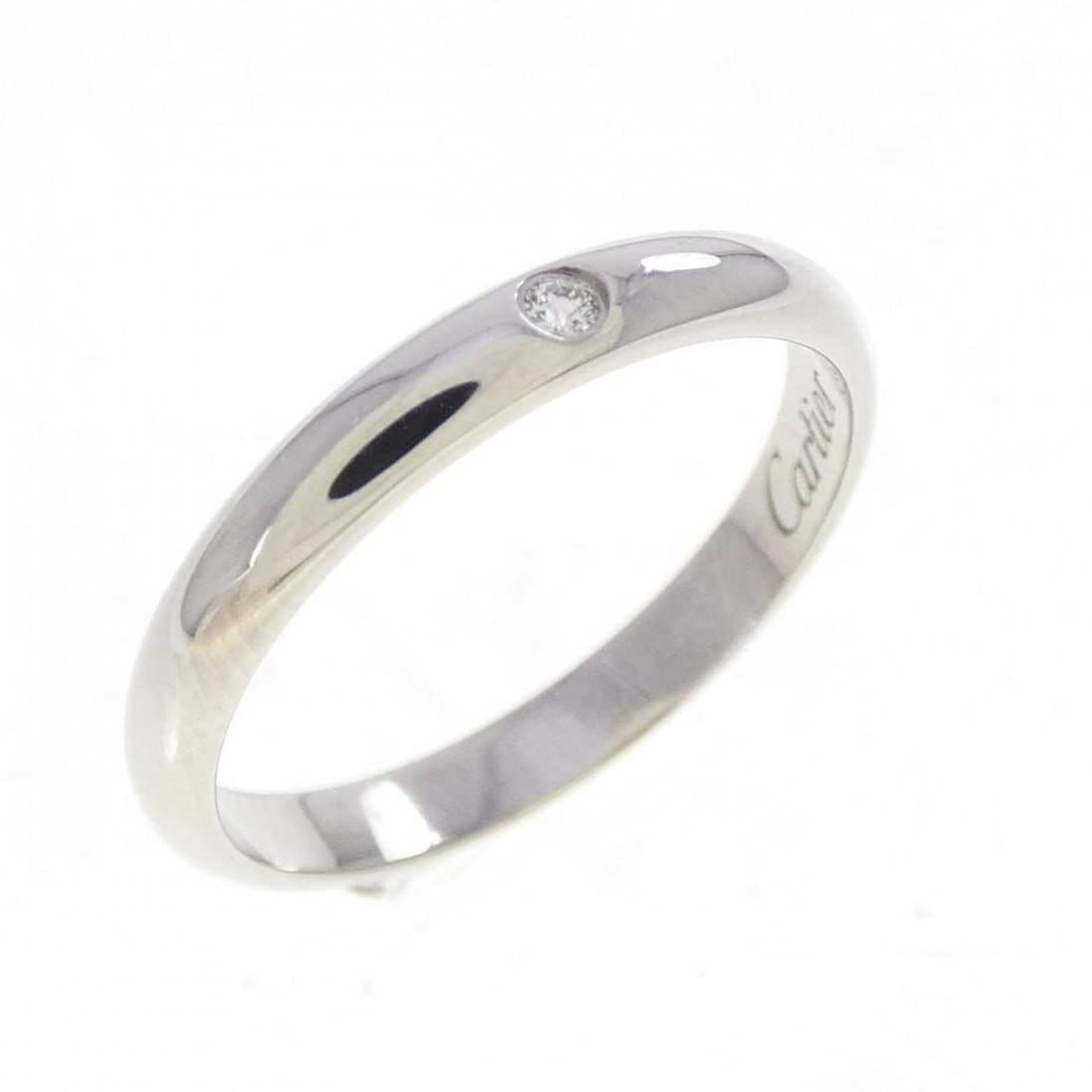 Cartier wedding ring: --- Catalog ---Category: SizeUS Size: 5Brand Size: 49Category: DesignType: Band ringStone: DiamondGender: WomenMaterial: Platinum 950Category: GeneralMPN: AGT452Brand: Cartier--- Item List ---Section: