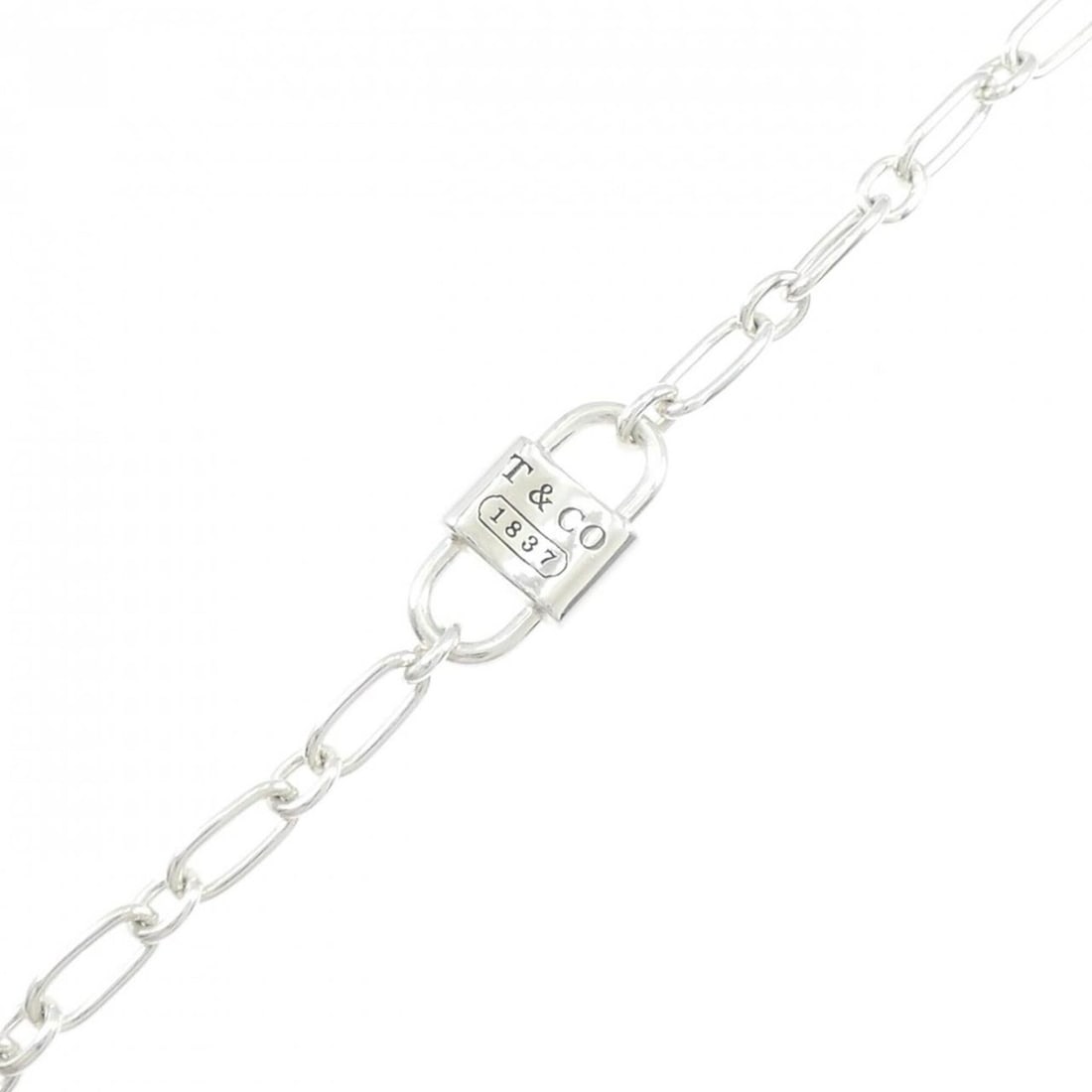 Tiffany Double Lock Small Bracelet: --- Catalog ---Category: SizeLength: 19.5cm / 7.67''Category: DesignType: Charm braceletGender: WomenMaterial: Silver 925Category: GeneralBrand: Tiffany--- Item List ---Section: ConditionRanking: Rank