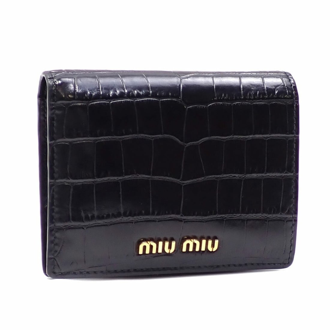Miu Miu Miu Bi-fold Wallet for Women, Black Leather, 5MV204, Embossed: --- Catalog ---Category: SizeSize (HxWxD): 9cm x 11cm x 2.5cm / 3.54'' x 4.33'' x 0.98''Category: DesignType: Wallet (bi-fold)Color: BlackGender: WomenMaterial: Leather Leather/Fur Type: Embossed leat