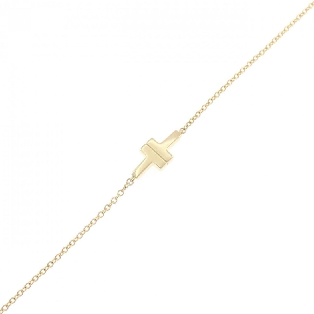 Tiffany & Co. Two Single Chain Bracelet: --- Catalog ---Category: SizeLength: 17cm / 6.69''Category: DesignType: Charm braceletGender: WomenMaterial: Yellow gold (18K)Category: GeneralBrand: Tiffany--- Item List ---Section: ConditionRanking: