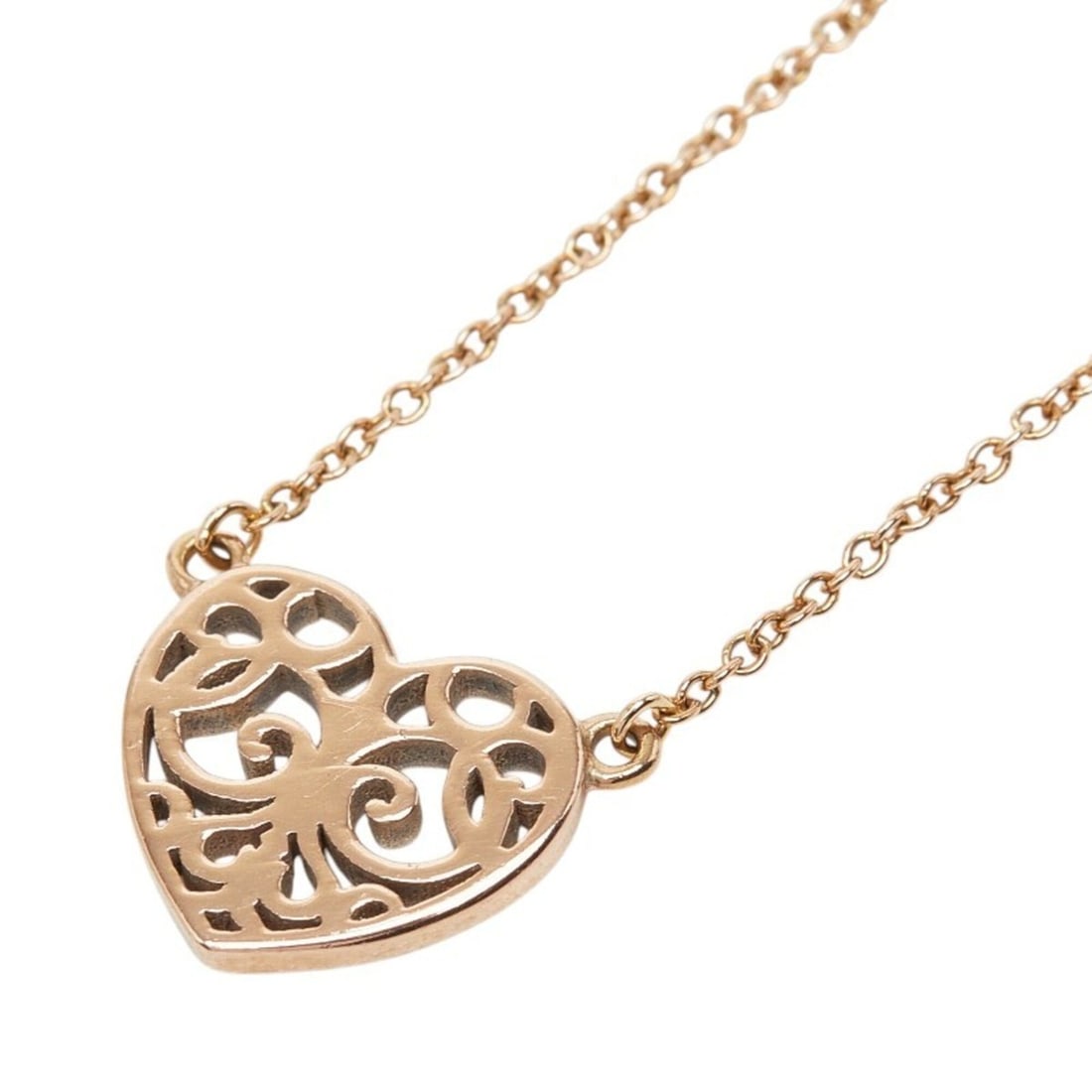Tiffany & Co. Enchanted Heart Necklace, Gold Rubedo Metal, Women's.: --- Catalog ---Category: SizePendant Size: 10.4mm x 11.4mm / 0.4'' x 0.44''Neck Circumference: 41 cm / 16.14''Category: DesignColor: GoldGender: WomenMaterial: MetalNecklace Type: NecklaceCategory: Ge