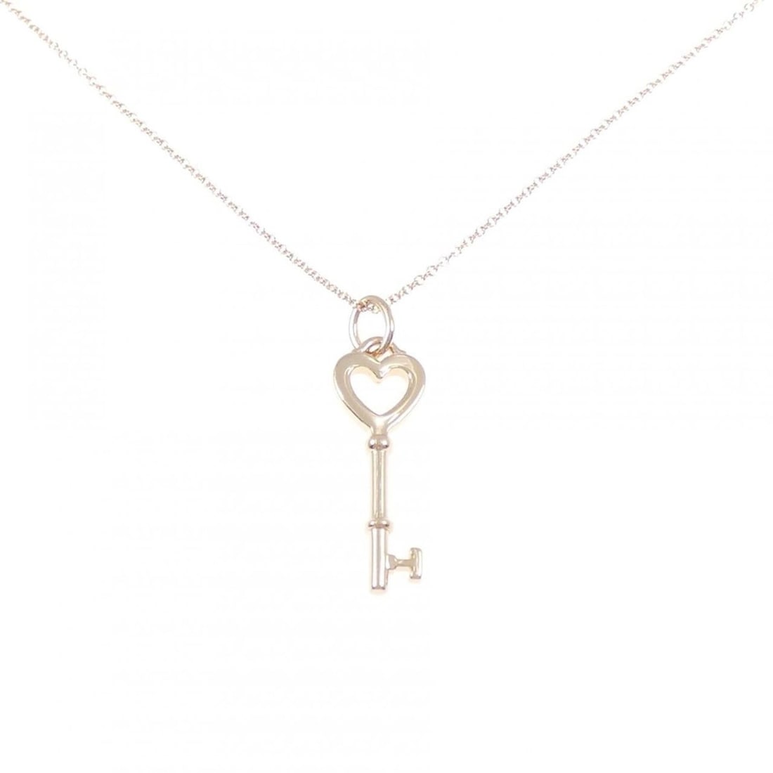 Tiffany Heart Key Mini Necklace: --- Catalog ---Category: SizePendant Size: 32.5mm x 9.5mm / 1.27'' x 0.37''Neck Circumference: 41 cm / 16.14''Category: DesignGender: WomenMaterial: Pink gold (18K)Pendant Type: PendantNecklace Type: 