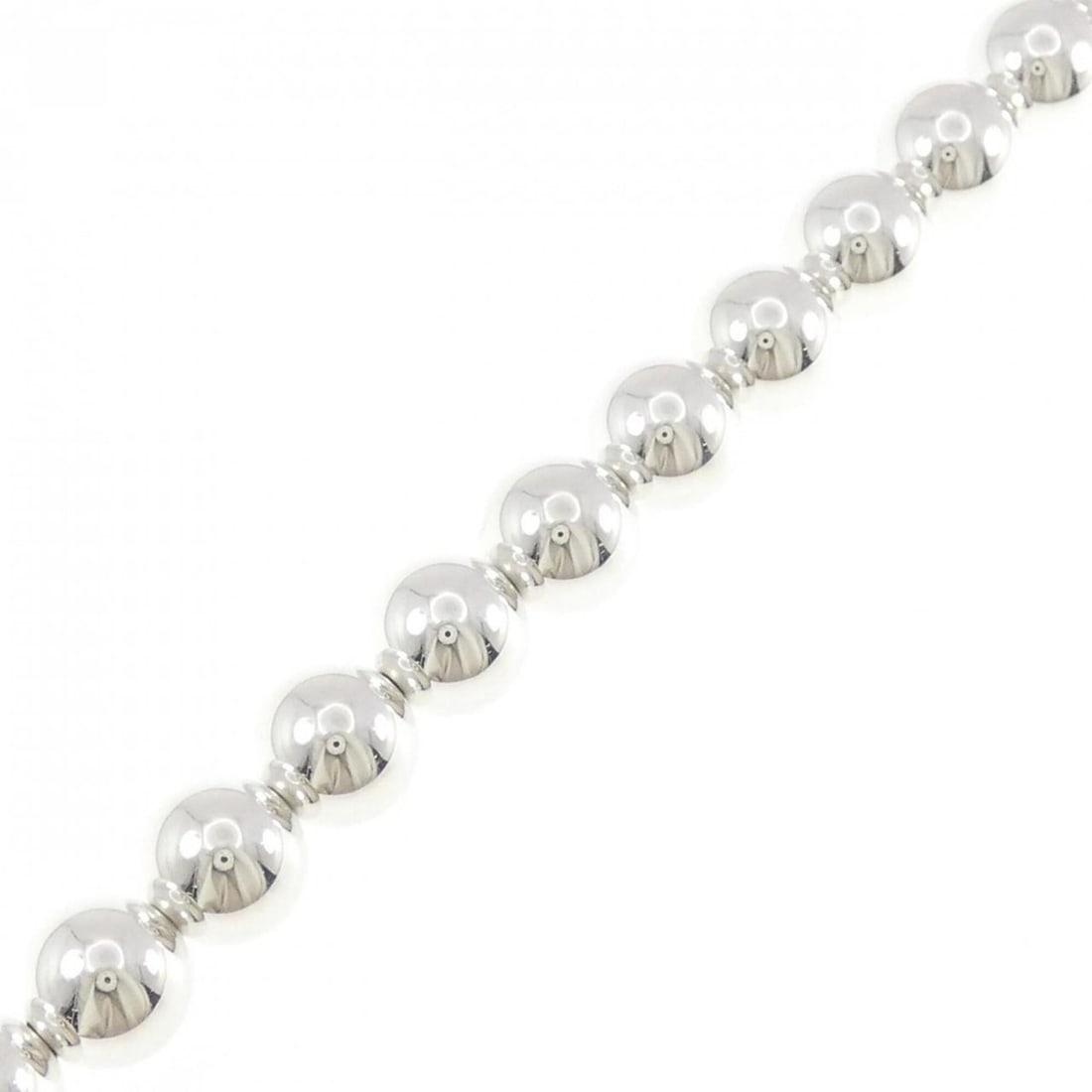 Tiffany Ball Bracelet: --- Catalog ---Category: SizeWidth: 9.9mm / 0.38''Weight: 18.4g / 0.64oz.Total Length: 19cm / 7.48''Category: DesignType: Charm braceletGender: WomenMaterial: Silver 925Category: GeneralBrand: Tiffany