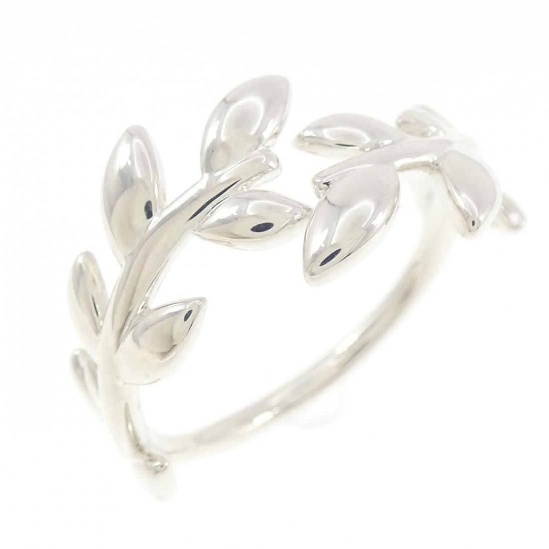 Tiffany Olive Leaf Bypass Ring: --- Catalog ---Category: SizeJP Size: 17US Size: 8.5Category: DesignColor: White goldGender: Women,MenMaterial: Silver 925Category: GeneralBrand: Tiffany--- Item List ---Section: ConditionRanking: Ran