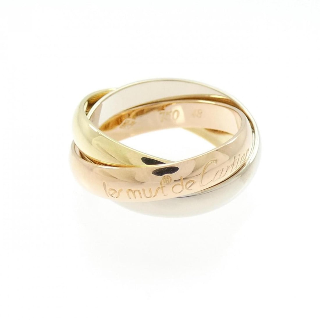 Cartier Trinity Ring: --- Catalog ---Category: SizeUS Size: 4.5Brand Size: 48Category: DesignType: Band ringColor: Pink gold, White gold, Yellow goldGender: WomenMaterial: Pink gold (18K), White gold (18K), Yellow gold (18