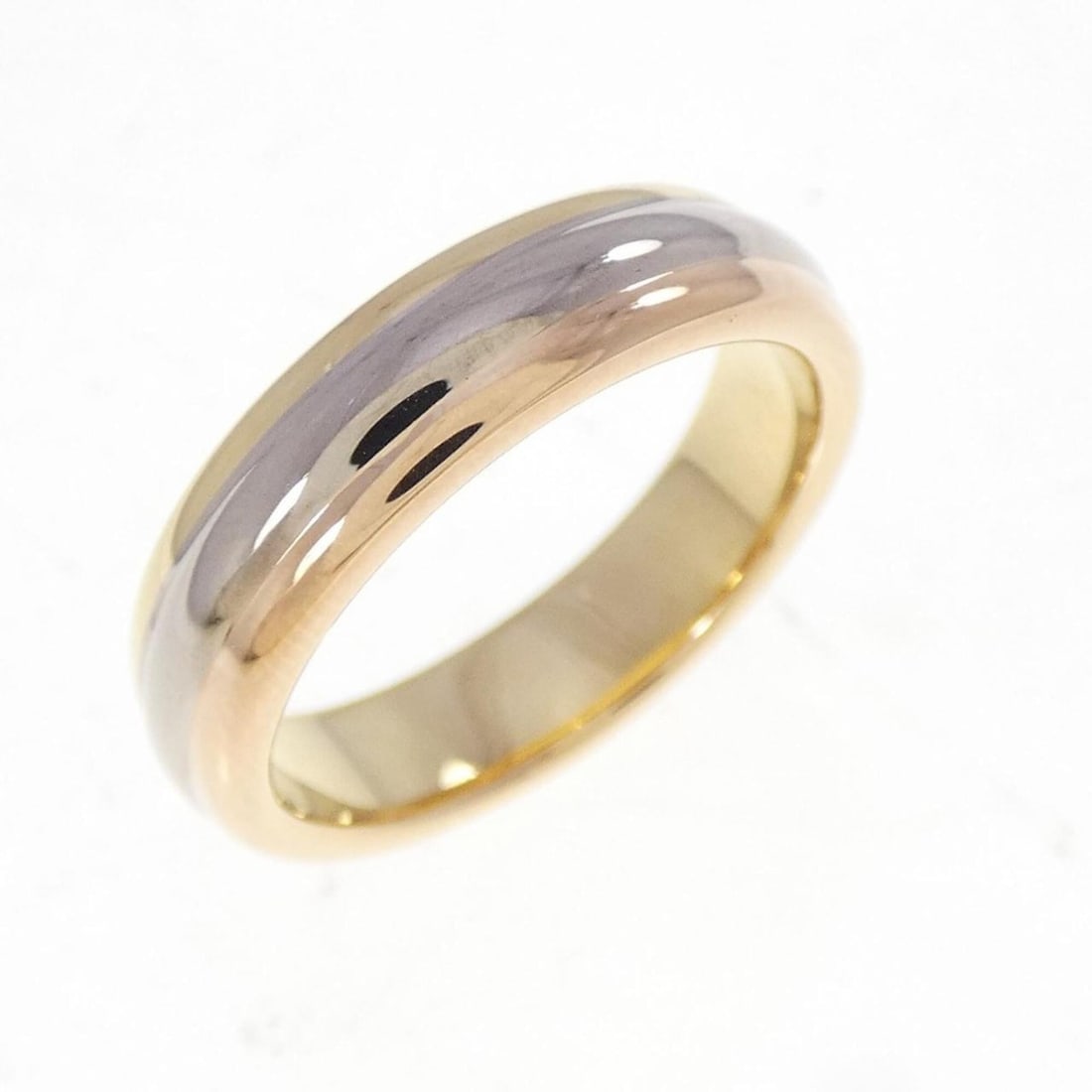 Cartier Three-Color Wedding Ring: --- Catalog ---Category: SizeUS Size: 6Brand Size: 51Category: DesignType: Wedding ringColor: Pink gold, White gold, Yellow goldGender: WomenMaterial: Pink gold (18K), White gold (18K), Yellow gold (1