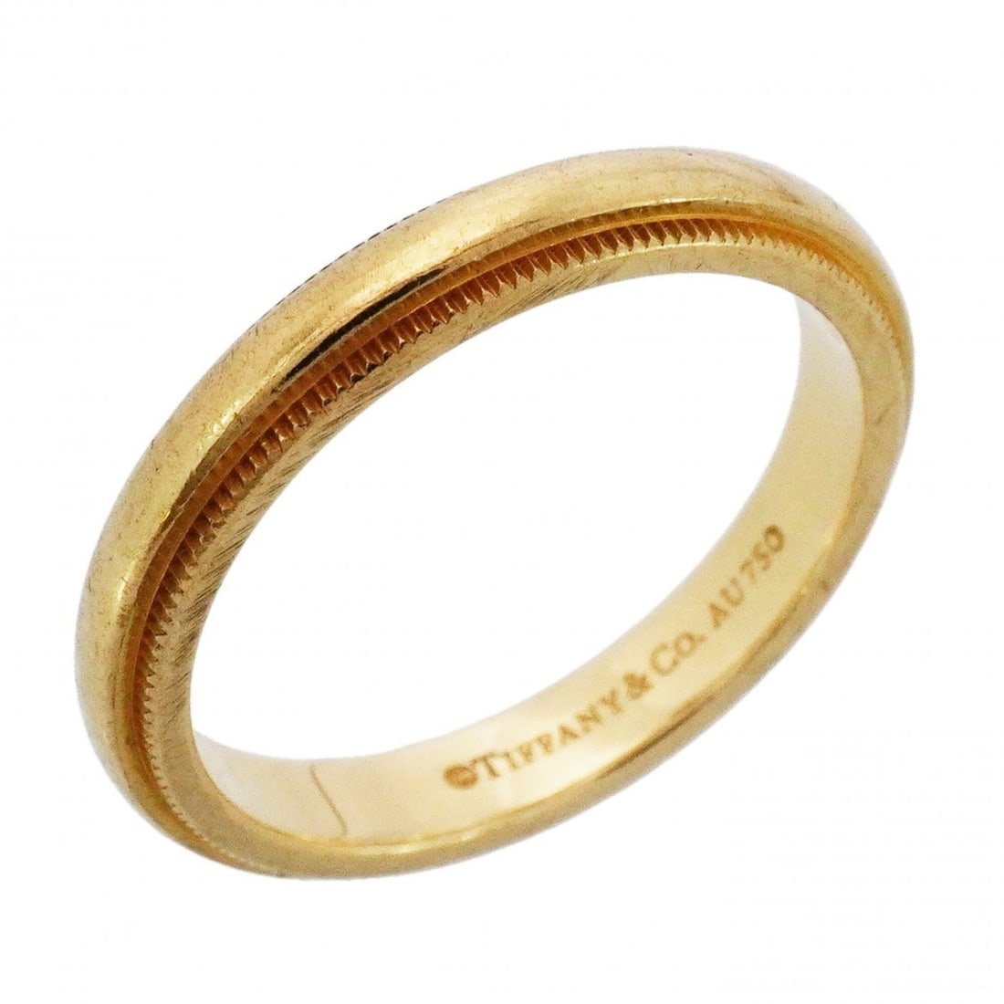 Tiffany & Co. Milgrain Ring, 18K Yellow Gold, Size 12.5 (Women's): --- Catalog ---Category: SizeJP Size: 12.5US Size: 6.5Category: DesignType: Band ringGender: WomenMaterial: Yellow gold (18K)Category: GeneralBrand: Tiffany--- Item List ---Section: ConditionRanking: 
