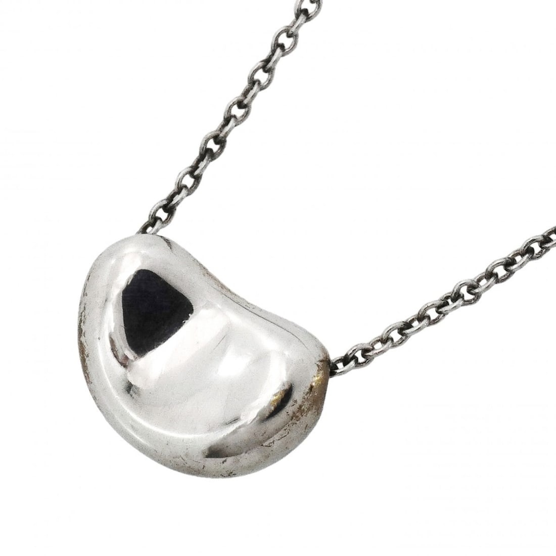 Tiffany & Co. Bean Necklace, Sterling Silver 925, Women's: --- Catalog ---Category: SizePendant Size: 7.5mm x 10.8mm / 0.29'' x 0.42''Neck Circumference: 42.5 cm / 16.73''Category: DesignGender: WomenMaterial: Silver 925Necklace Type: NecklaceCategory: Genera