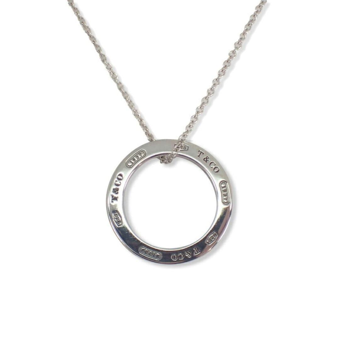 TIFFANY & Co. 925 1837 Circle Necklace: --- Catalog ---Category: SizePendant Size: 17.8mm / 0.7''Neck Circumference: 41 cm / 16.14''Category: DesignGender: WomenMaterial: Metal, Sterling silver 925Necklace Type: NecklaceCategory: GeneralBra