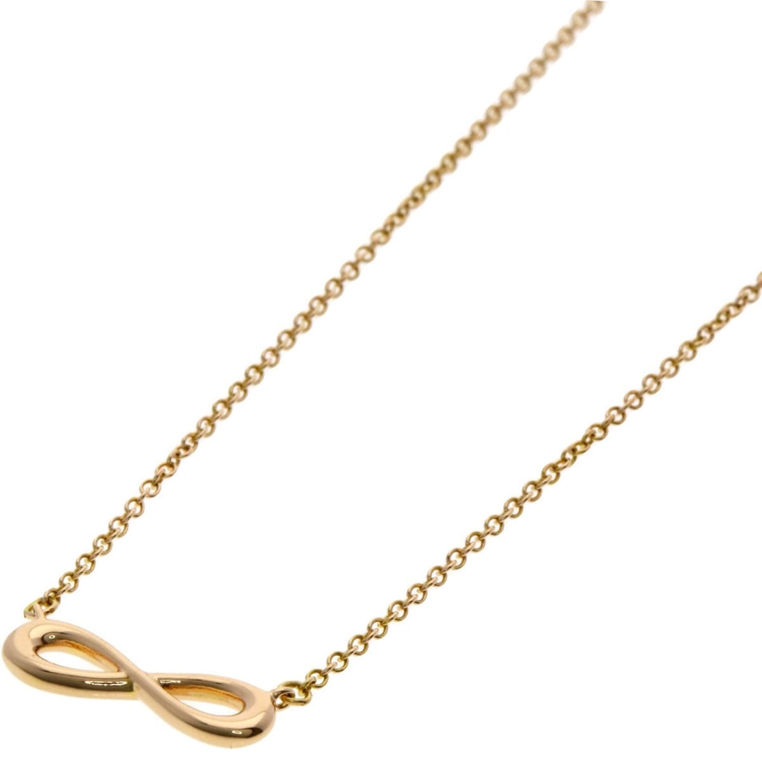 Tiffany & Co. Infinity Necklace, 18K Pink Gold, Women's.: --- Catalog ---Category: SizeWidth: 1mm / 0.04''Weight: 2g / 0.07oz.Pendant Size: 4.2mm x 14.3mm / 0.16'' x 0.56''Neck Circumference: 44 cm / 17.32''Category: DesignGender: WomenMaterial: Pink gold (1