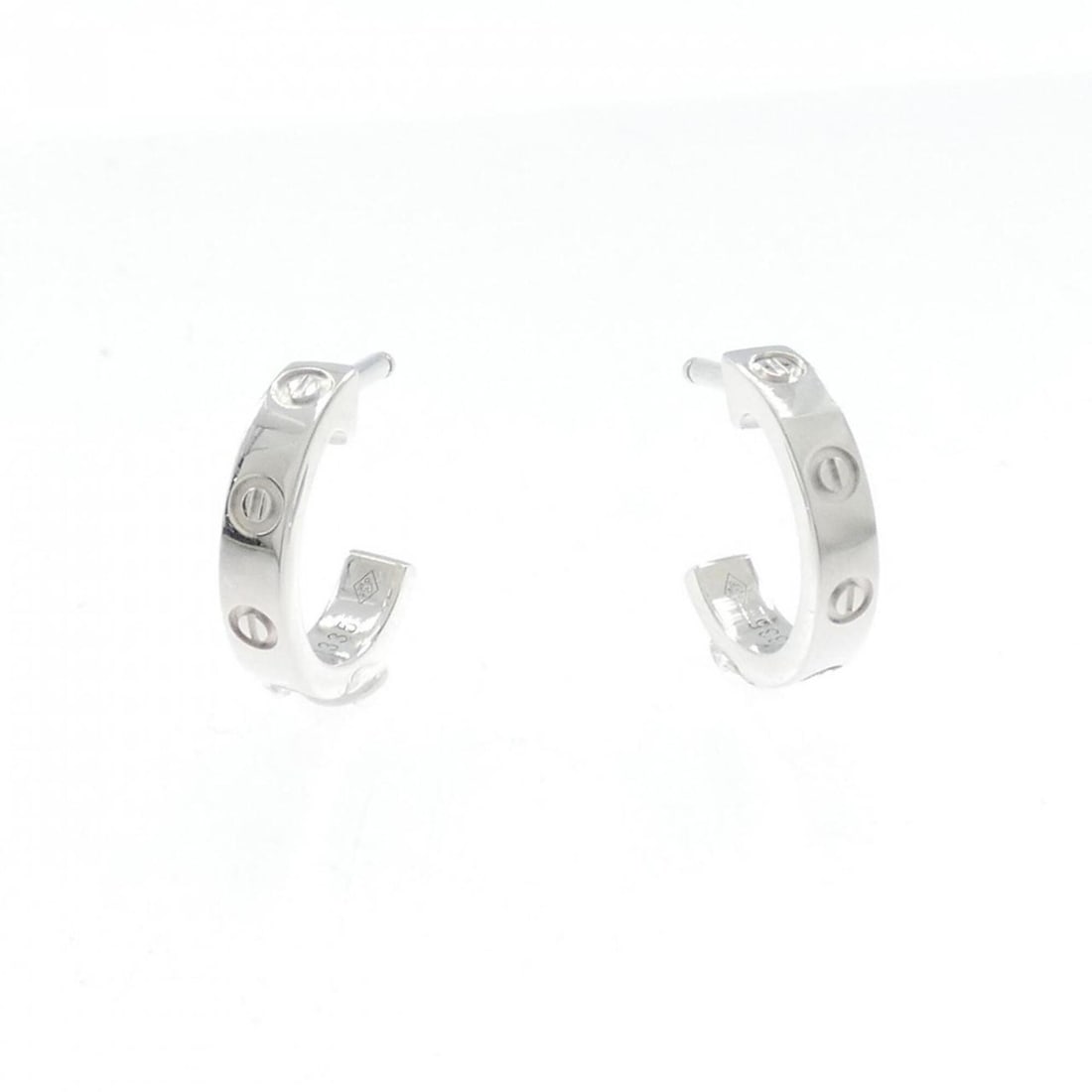 Cartier Mini Love Earrings: --- Catalog ---Category: SizeStone Size (HxW): 12.70mm x 2.60mm / 0.50'' x 0.10''Category: DesignColor: WhiteGender: WomenMaterial: White goldCategory: GeneralMPN: B8028900Brand: Cartier--- Item List 