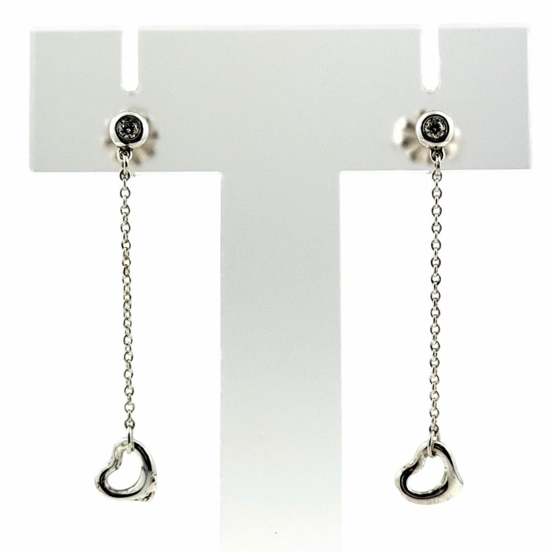 TIFFANY&Co. Tiffany & Co. Elsa Peretti By the Yard AG925 Sterling Silver Earrings, 1 Diamond, 2.6mm: --- Catalog ---Category: SizeWeight: 1.4g / 0.04oz.Size (HxWxD): 7.00mm x 6.00mm / 0.28'' x 0.24''Category: DesignColor: SilverStone: DiamondGender: WomenMaterial: Silver 925Category: GeneralBrand: Ti