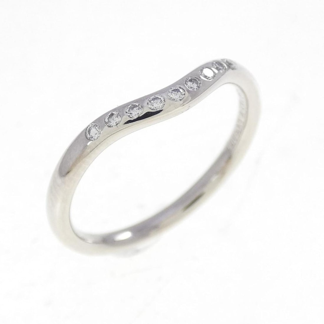Tiffany Curved 9P Ring: --- Catalog ---Category: SizeJP Size: 10.5US Size: 5.5Category: DesignType: Band ringStone: DiamondGender: WomenMaterial: Platinum 950Category: GeneralBrand: Tiffany--- Item List ---Section: Condition