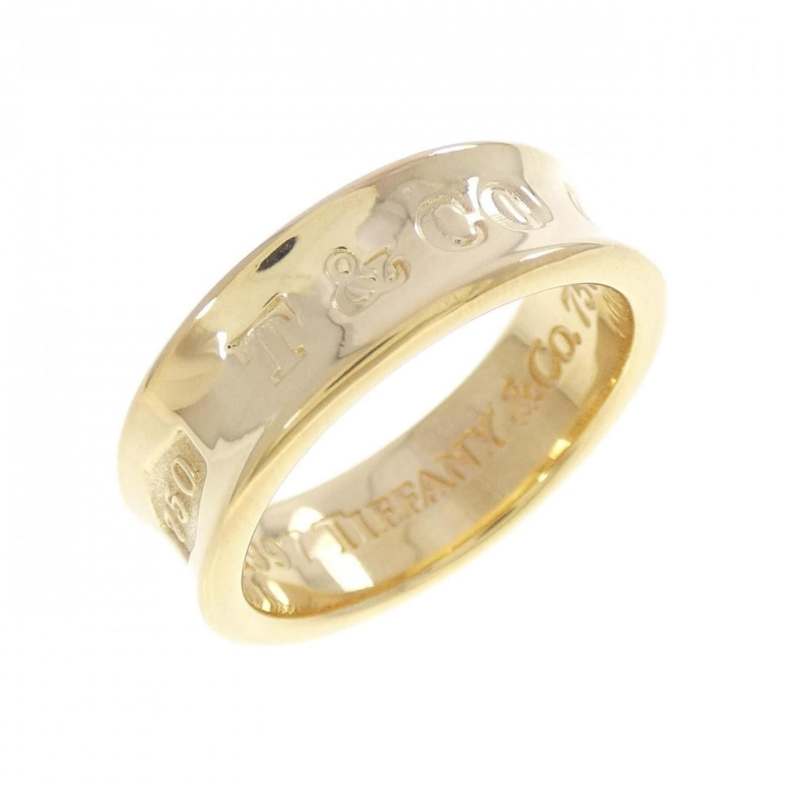 Tiffany & Co. 1837 Ring: --- Catalog ---Category: SizeWidth: 5.9mm / 0.23''Weight: 6.3g / 0.22oz.JP Size: 9.5US Size: 5Category: DesignType: Band ringGender: WomenMaterial: Yellow gold (18K)Category: GeneralLine: 1837Brand: T