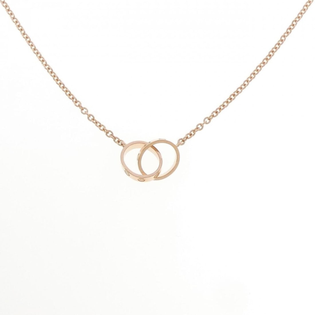 Cartier Baby Love Necklace: --- Catalog ---Category: SizeWidth: 1.9mm / 0.07''Weight: 6.5g / 0.22oz.Diameter: 9.7mm / 0.38''Neck Circumference: 44 cm / 17.32''Category: DesignColor: PinkGender: WomenMaterial: Pink goldNecklace T