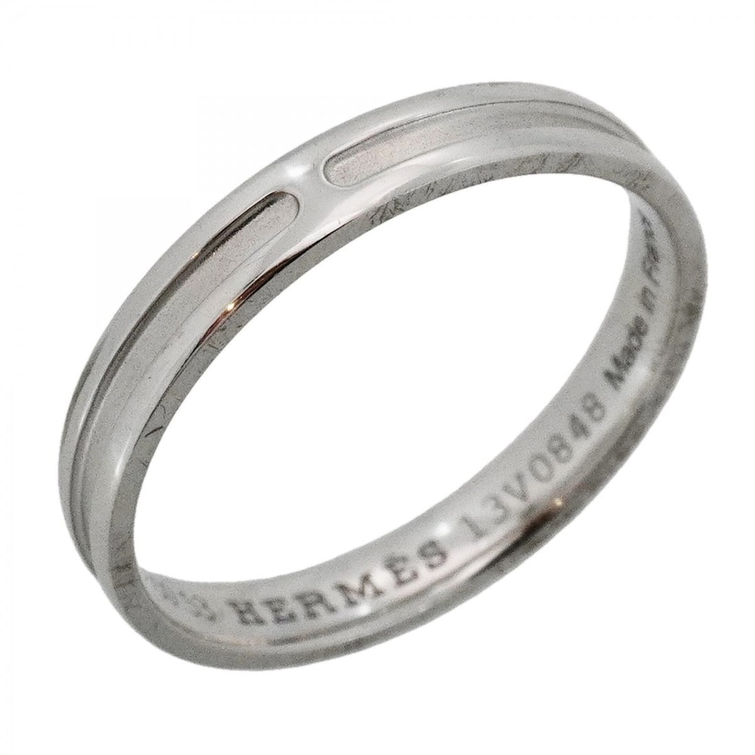 Hermes Empreinte Ring, 18K White Gold, Size 53, Women's: --- Catalog ---Category: SizeUS Size: 6.5Brand Size: 53Category: DesignType: Band ringGender: WomenMaterial: White gold (18K)Category: GeneralBrand: Hermes--- Item List ---Section: ConditionRanking: R