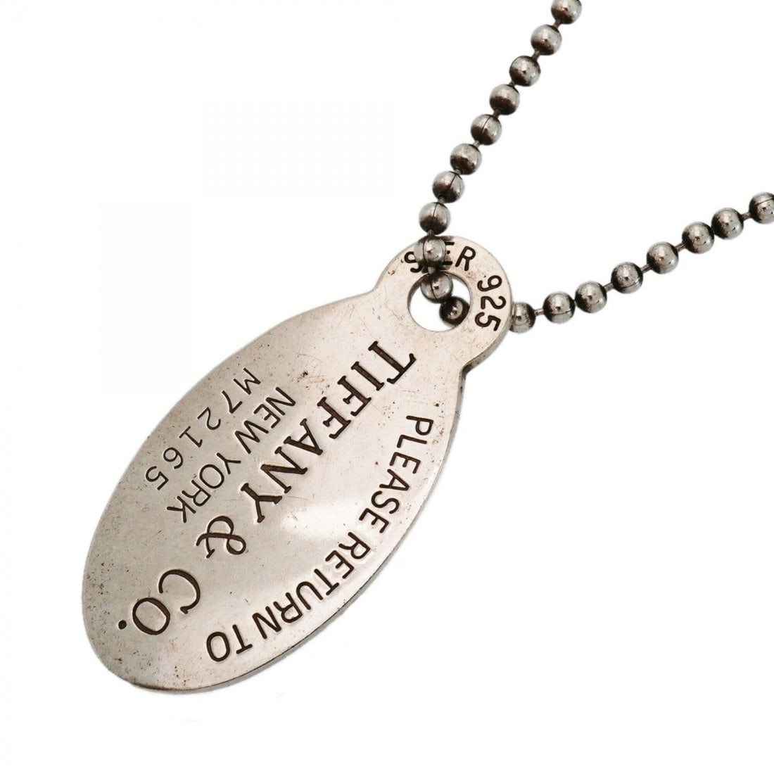 Tiffany & Co. Return to Dreams Ball Chain Oval Sterling Silver Necklace for Women: --- Catalog ---Category: SizePendant Size: 42.5mm x 20.7mm / 1.67'' x 0.81''Neck Circumference: 87 cm / 34.25''Category: DesignGender: WomenMaterial: Silver 925Necklace Type: NecklaceCategory: General