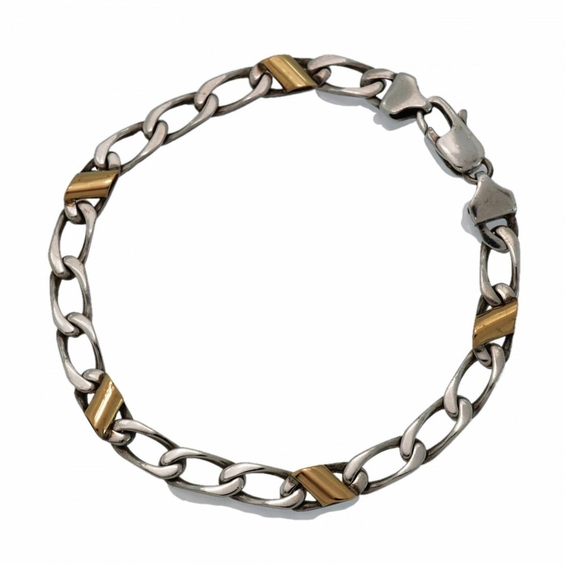 Tiffany & Co. Figaro Bracelet, 18K Yellow Gold (KYG), Sterling Silver 925, Women's: --- Catalog ---Category: SizeLength: 18.5cm / 7.28''Category: DesignType: Charm braceletGender: WomenMaterial: Silver 925, Yellow gold (18K)Category: GeneralBrand: Tiffany--- Item List ---Section: Con
