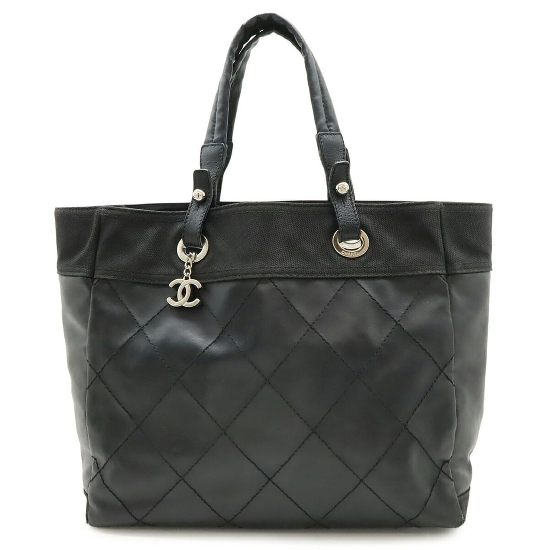 CHANEL Paris Biarritz Tote MM Bag Handbag Coated Canvas Black A34209: --- Catalog ---Category: SizeSize (HxWxD): 31cm x 35cm x 14.5cm / 12.2'' x 13.77'' x 5.7''Category: DesignType: Handbag, Tote bagColor: Black, WhiteGender: WomenMaterial: Coated canvas Category: Gener