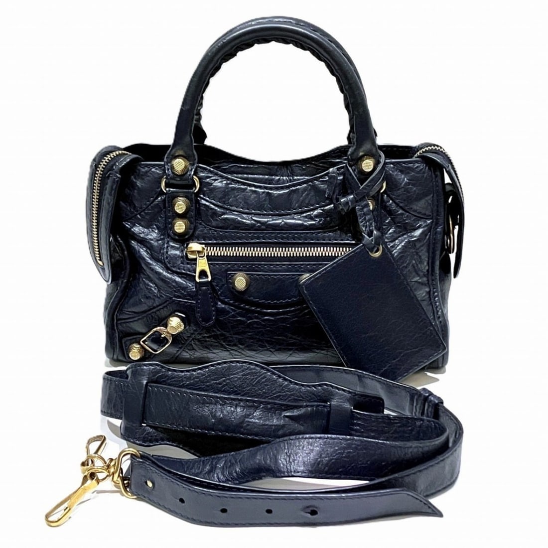 Balenciaga Mini City Handbag, Giant Leather, 309544: --- Catalog ---Category: SizeSize (HxWxD): 15cm x 24cm x 8cm / 5.9'' x 9.44'' x 3.14''Strap Length: 107cm - 113cm / 42.12'' - 44.48''Handle Length: 25cm / 9.84''Category: DesignType: HandbagColor: Nav