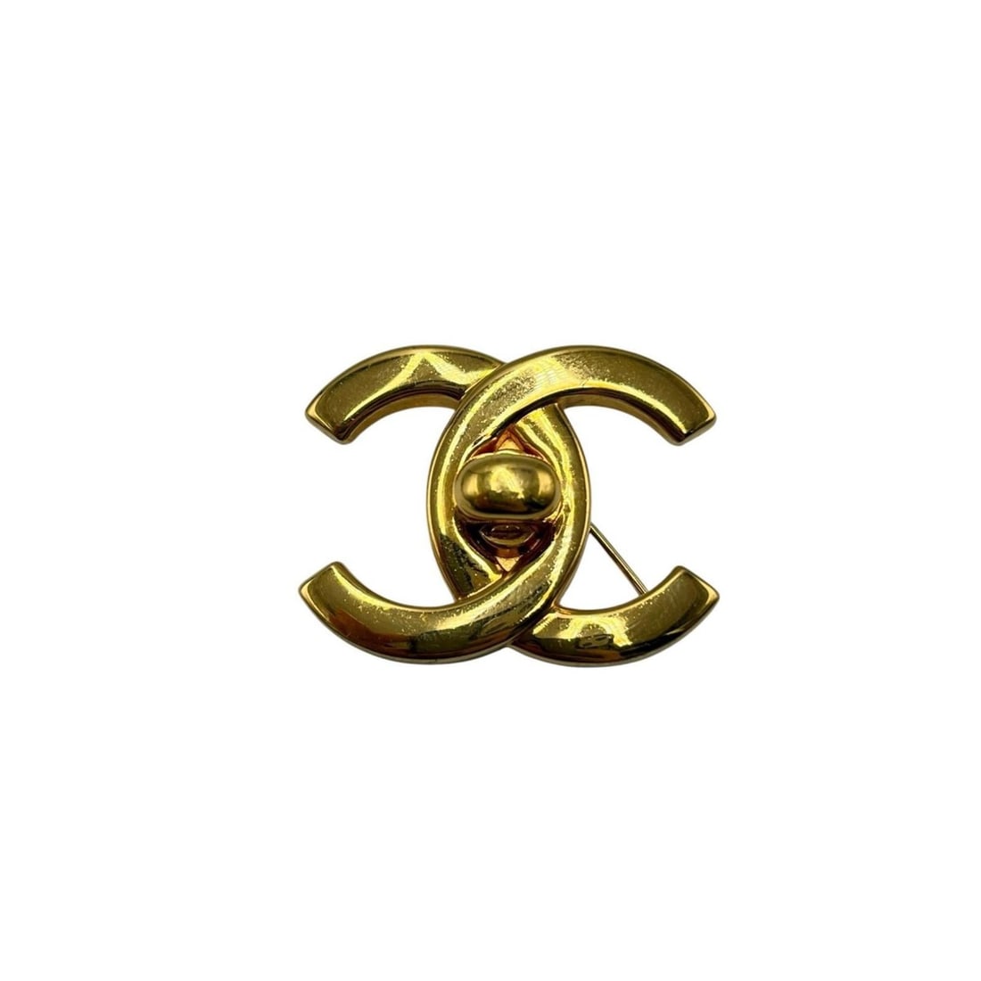 Chanel Coco Mark Turnlock Brooch, GP Gold, Women's: --- Catalog ---Category: SizeSize (HxWxD): 2.9cm x 3.7cm / 1.14'' x 1.45''Category: DesignType: BroochColor: GoldGender: WomenMaterial: Gold platingCategory: GeneralBrand: Chanel--- Item List ---Secti