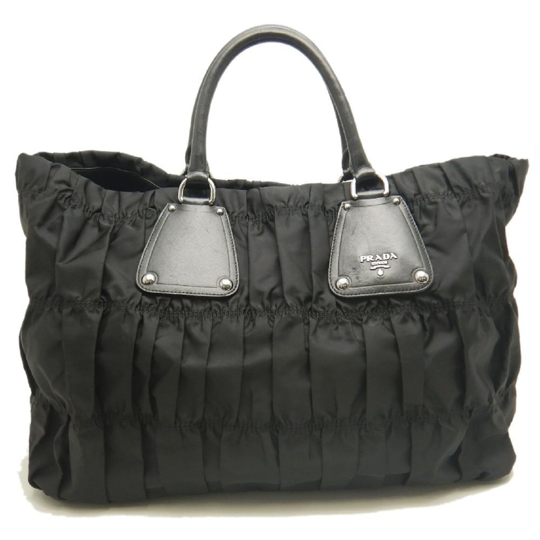 PRADA Prada Gathered Tote BN1232 Bag Tessuto NERO Women's 253772: --- Catalog ---Category: SizeSize (HxWxD): 31cm x 40cm x 16cm / 12.2'' x 15.74'' x 6.29''Category: DesignType: Tote bagColor: NeroGender: WomenClosure: MagnetMaterial: Nylon Hardware Color: SilverCate