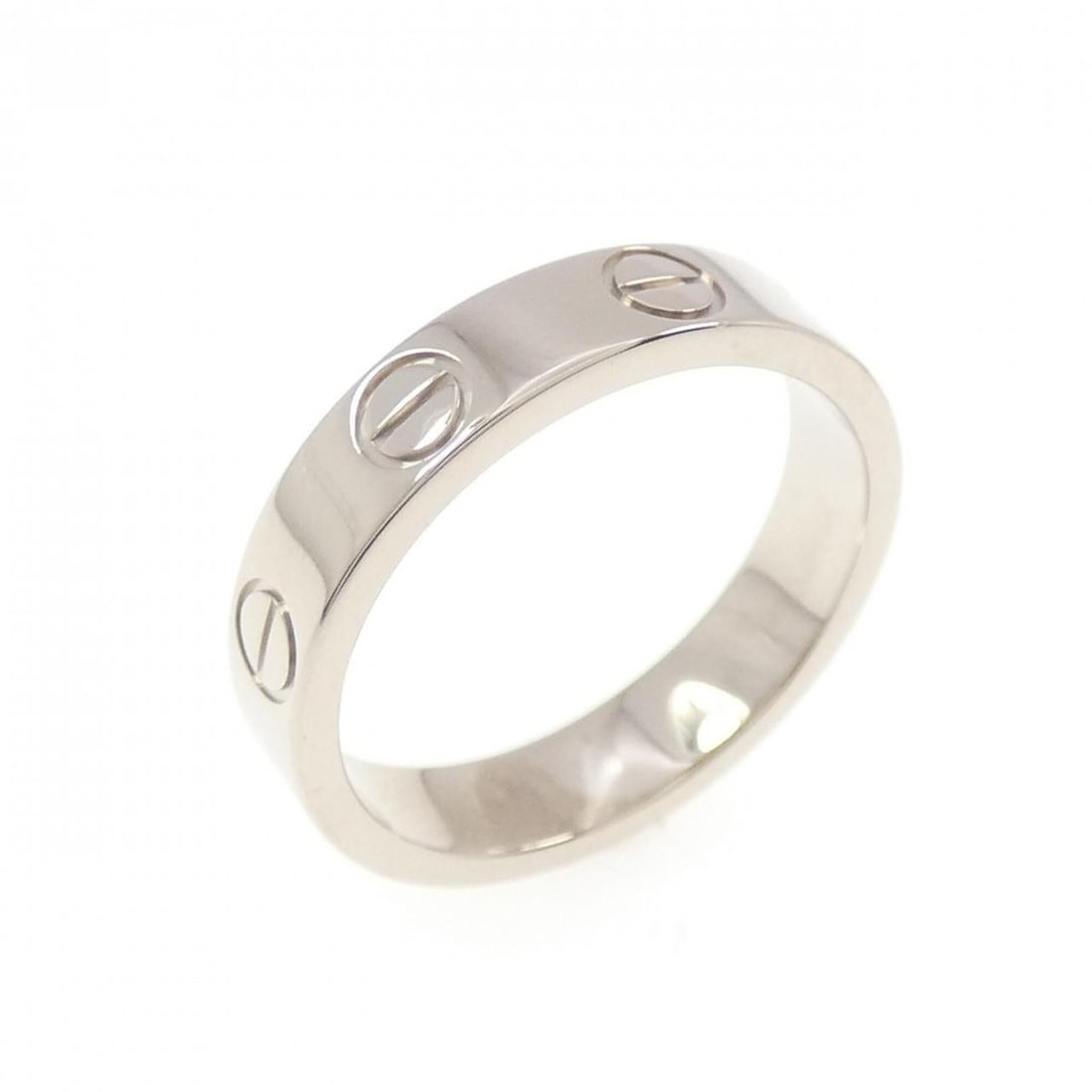 Cartier Mini Love Ring: --- Catalog ---Category: SizeWidth: 3.5mm / 0.14''Weight: 3.5g / 0.12oz.JP Size: 6US Size: 3.5Brand Size: 46Category: DesignType: Band ringMetal: White GoldGender: WomenMetal Purity: 18KCategory: Gene