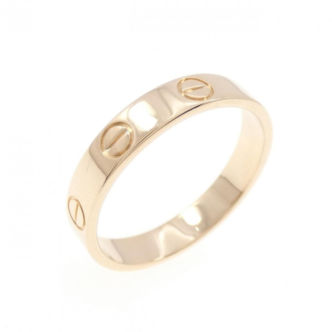 Cartier Mini Love Ring: --- Catalog ---Category: SizeUS Size: 7Brand Size: 54Category: DesignType: Band ringGender: WomenMaterial: Pink gold (18K)Category: GeneralBrand: Cartier--- Item List ---Section: ConditionRanking: Ran