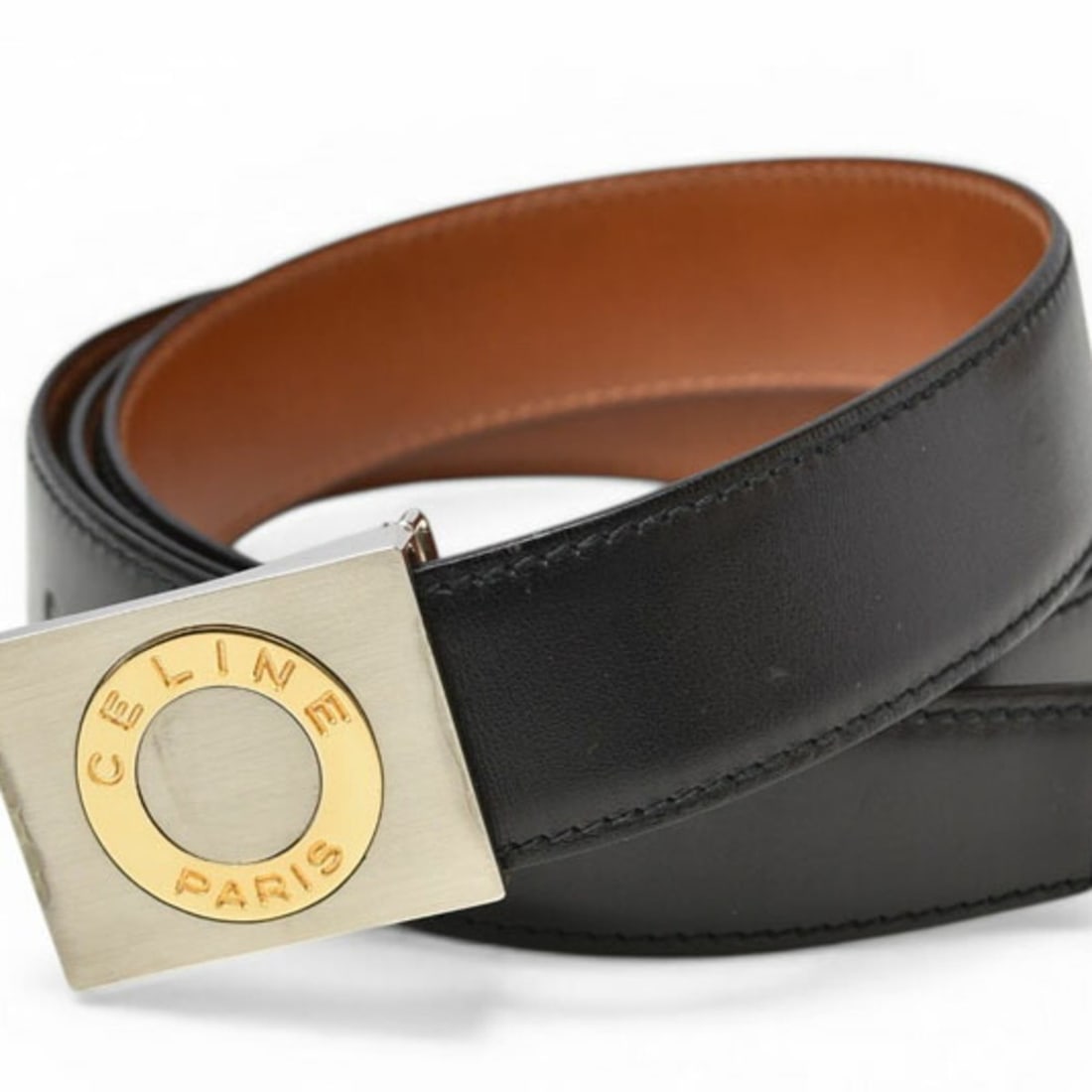 Celine Reversible Belt, One Size Fits All, Leather, Black/Brown, Men's: --- Catalog ---Category: SizeWidth: 2.9cm / 1.14''Length: 119cm / 46.85''Weight: 144g / 5.07oz.One Size: YesBuckle Size: 3.8cm x 4.2cm / 1.49'' x 1.65''Category: DesignType: Standard beltColor: Black,