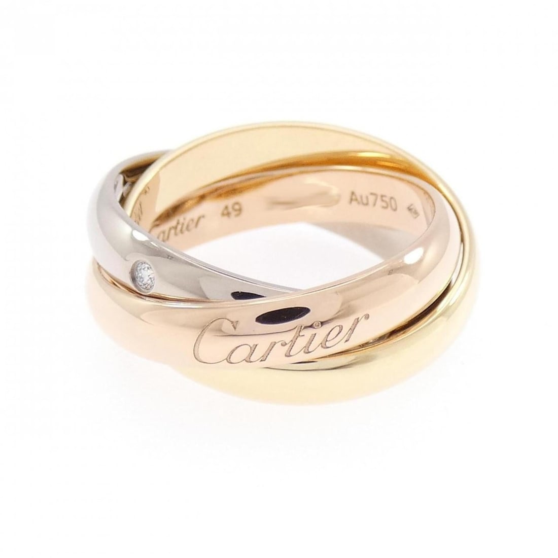Cartier Trinity Ring: --- Catalog ---Category: SizeUS Size: 5Brand Size: 49Category: DesignType: Band ringGender: WomenMaterial: Pink gold (18K), White gold (18K), Yellow gold (18K)Category: GeneralBrand: Cartier--- Item L