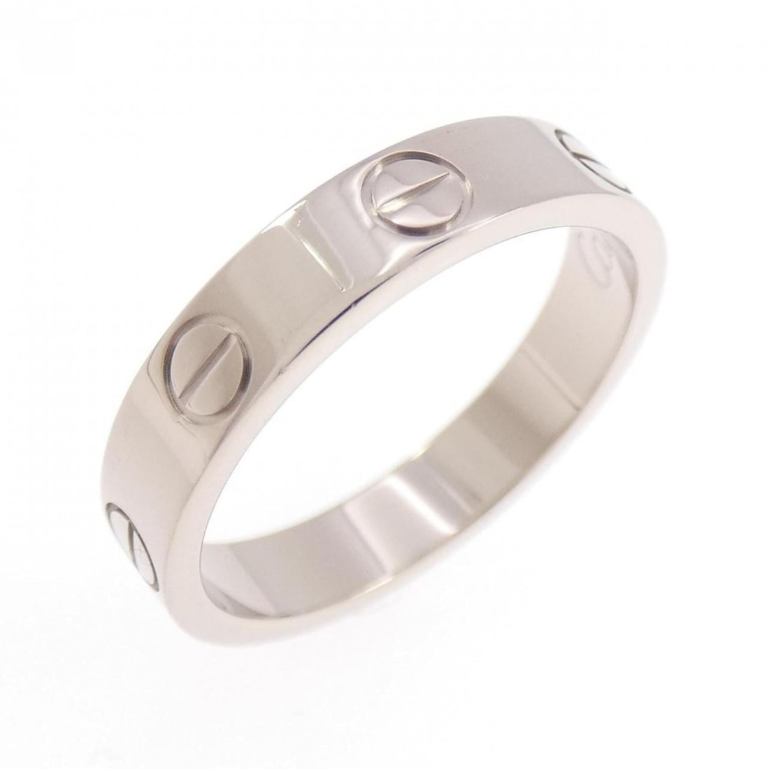 Cartier Mini Love Ring: --- Catalog ---Category: SizeWidth: 3.5mm / 0.14''Weight: 3.8g / 0.13oz.JP Size: 10US Size: 5.5Category: DesignType: Band ringGender: WomenMaterial: White gold (18K)Category: GeneralLine: LoveBrand: C
