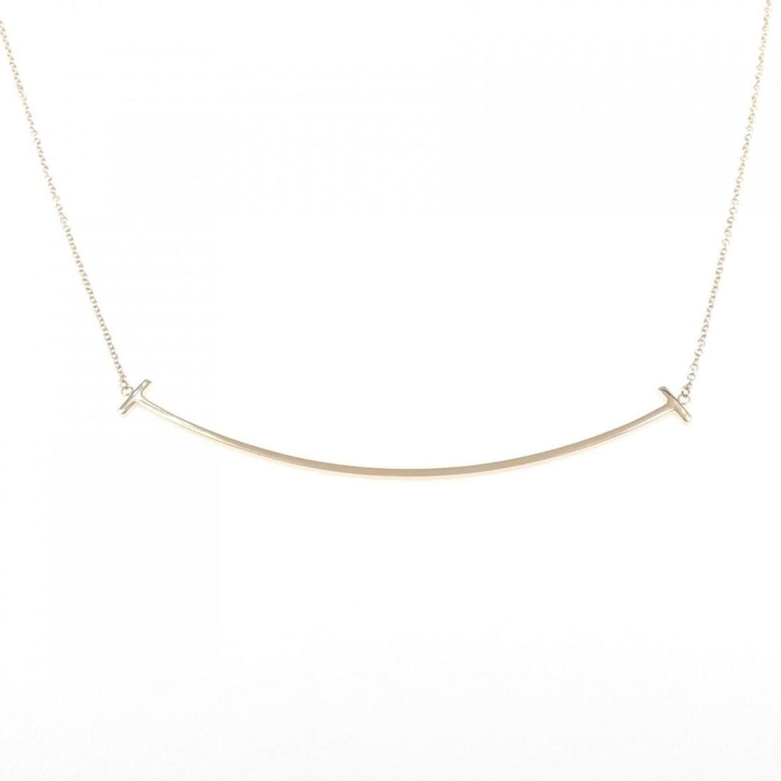 Tiffany & Co. T Smile Large Necklace: --- Catalog ---Category: SizePendant Size: 5.6mm x 67.8mm / 0.22'' x 2.66''Neck Circumference: 40 cm - 45 cm / 15.74'' - 17.71''Category: DesignColor: Pink goldGender: WomenMaterial: Pink gold (18K)Pe