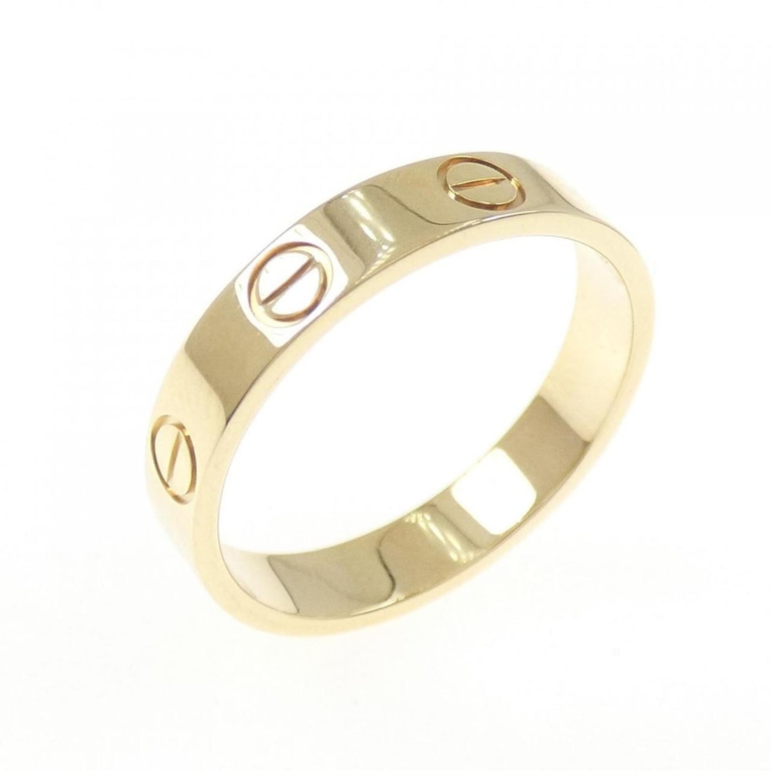 Cartier Mini Love Ring: --- Catalog ---Category: SizeWidth: 3.5mm / 0.14''Weight: 3g / 0.1oz.JP Size: 11US Size: 6Category: DesignType: Band ringGender: WomenMaterial: Yellow gold (18K)Category: GeneralLine: LoveBrand: Carti