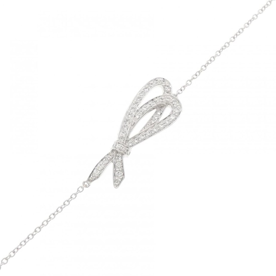 Tiffany Bow Bracelet: --- Catalog ---Category: SizeLength: 17cm / 6.69''Category: DesignType: Charm braceletColor: White goldGender: WomenMaterial: White gold (18K)Category: GeneralBrand: Tiffany--- Item List ---Section: C