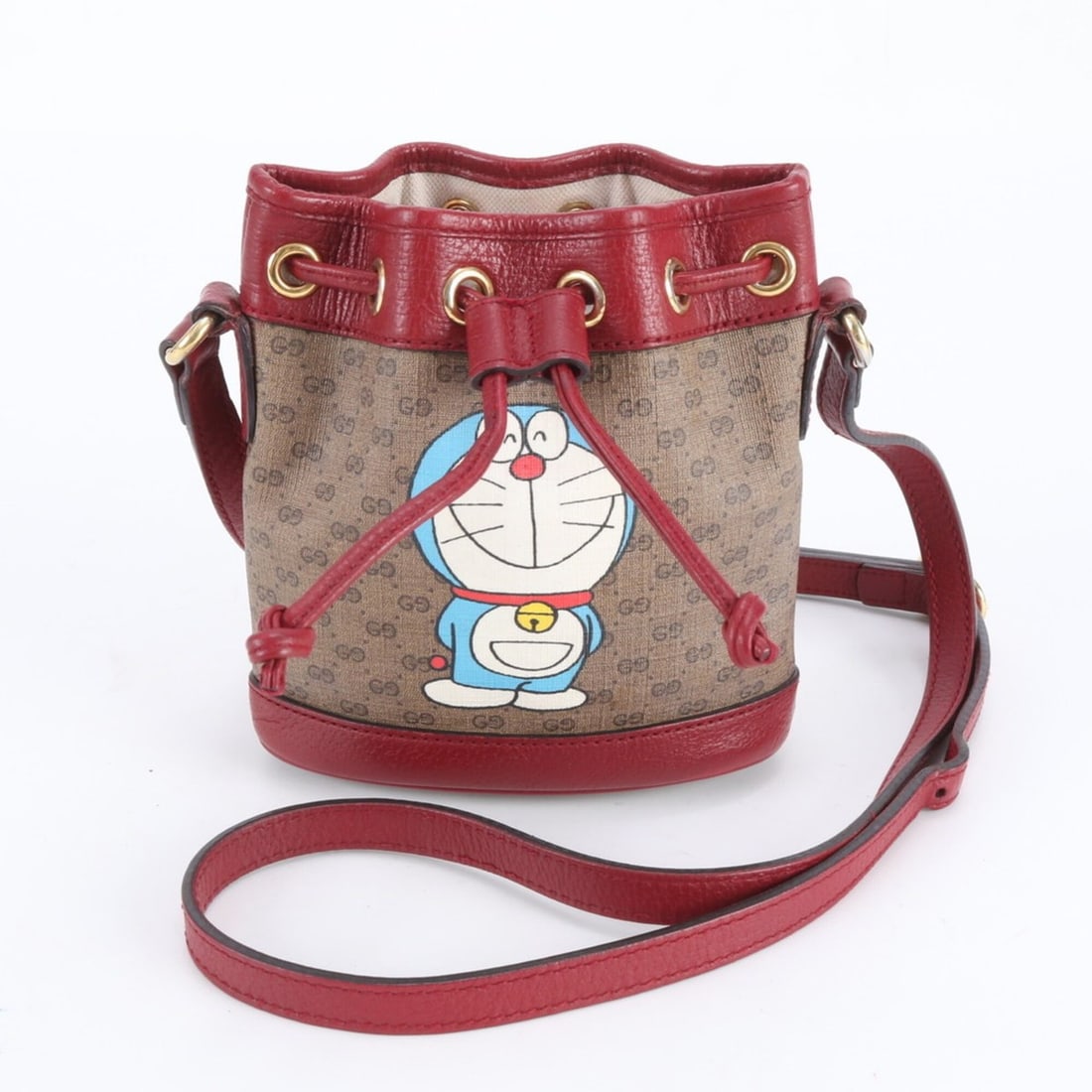 Gucci x Doraemon Collaboration Micro GG 647801 Leather Shoulder Bag, Crossbody Bag for Women: --- Catalog ---Category: SizeSize (HxWxD): 16cm x 15cm x 7cm / 6.29'' x 5.9'' x 2.75''Strap Length: 125cm / 49.21''Category: DesignType: Shoulder bagColor: BrownGender: WomenMaterial: Leather , Coated