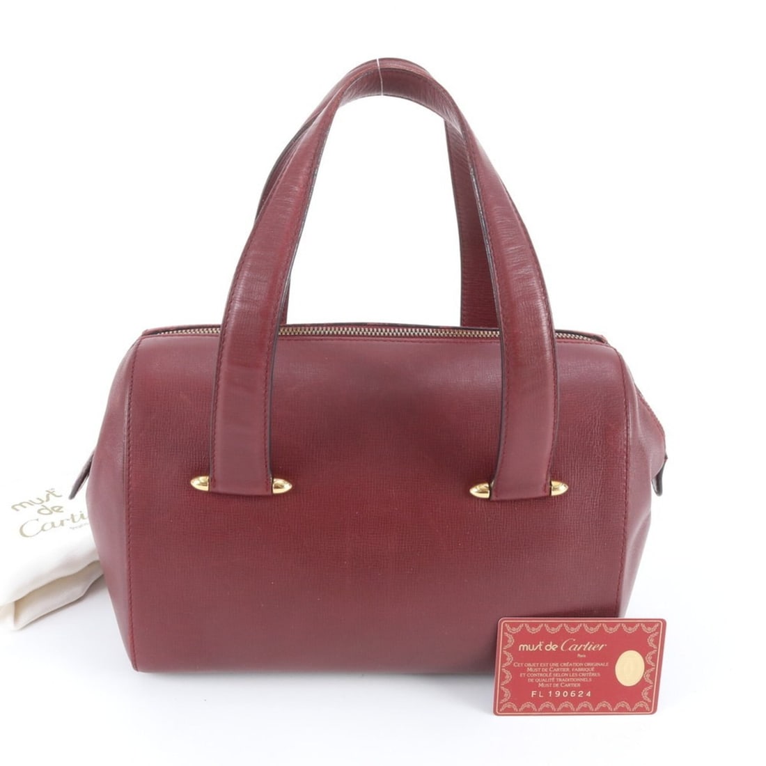 Cartier Must Line Leather Handbag Mini Boston Tote Bag with Guarantee Card - Women's: --- Catalog ---Category: SizeSize (HxWxD): 18cm x 25cm x 10cm / 7.08'' x 9.84'' x 3.93''Handle Length: 46cm / 18.11''Category: DesignType: Handbag, Tote bagColor: Wine redGender: WomenMaterial: Leathe
