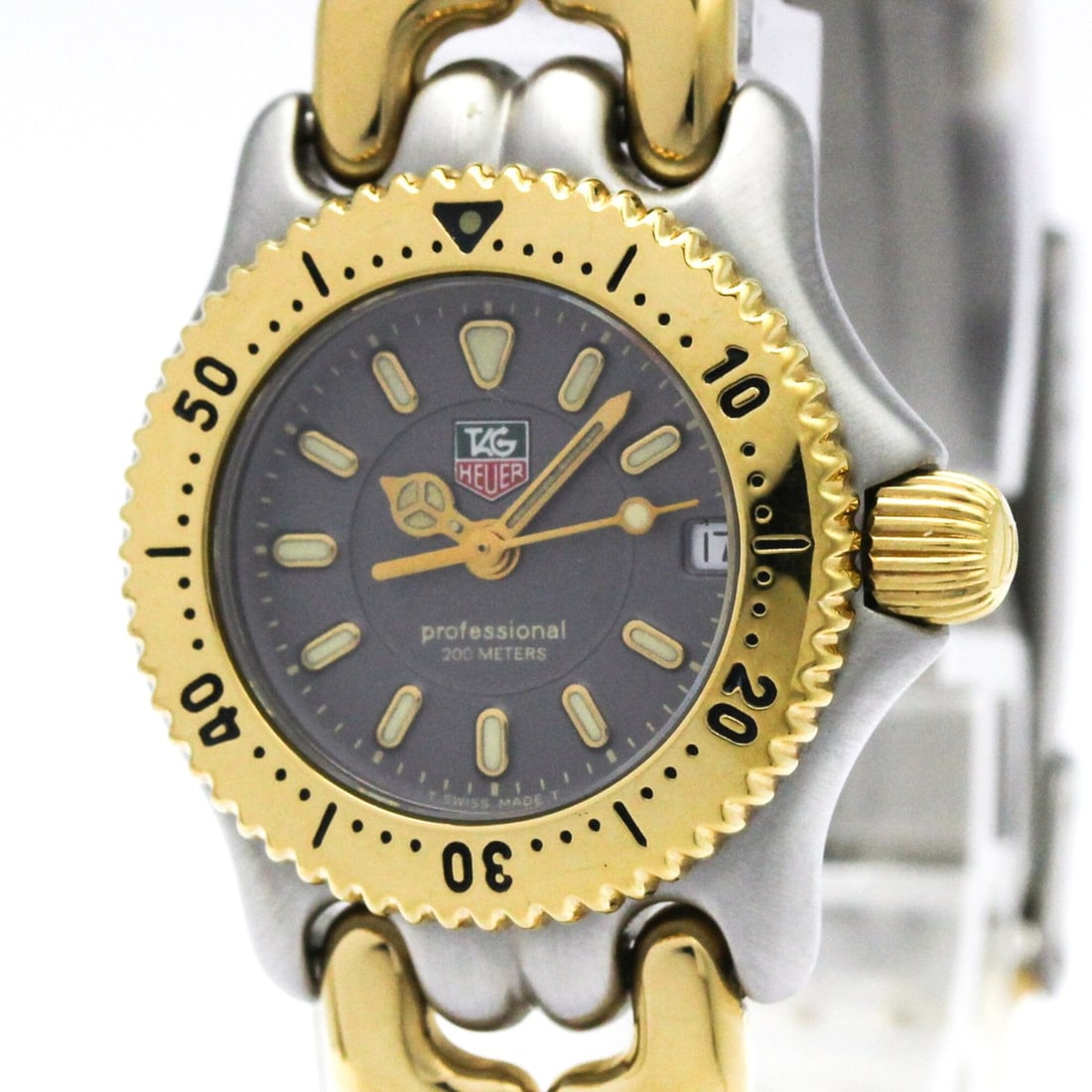 TAG HEUER Sel Professional 200M Gold Plated Steel Ladies Watch WG1420: --- Catalog ---Category: SizeCase Diameter: 24mm / 0.94''Category: DesignType: WristwatchStyle: Dress/FormalGender: WomenColor (Dial): GrayMaterial (Band): Gold plated, Stainless steelMaterial (Case):