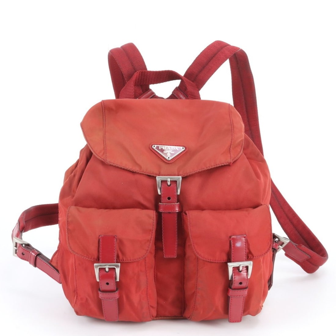 Prada Tessuto Nylon Triangle Logo Leather Backpack Rucksack Shoulder Bag for Women: --- Catalog ---Category: SizeSize (HxWxD): 26cm x 23cm x 12cm / 10.23'' x 9.05'' x 4.72''Strap Length: 75cm / 29.52''Handle Length: 22cm / 8.66''Category: DesignType: BackpackColor: Red colorGender: W