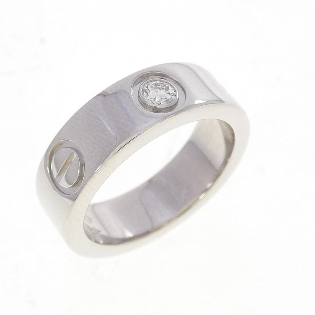 Cartier Love 1P Ring: --- Catalog ---Category: SizeUS Size: 4Brand Size: 47Category: DesignType: Band ringColor: PlatinumStone: DiamondGender: WomenMaterial: Platinum 950Category: GeneralBrand: Cartier--- Item List ---Sect