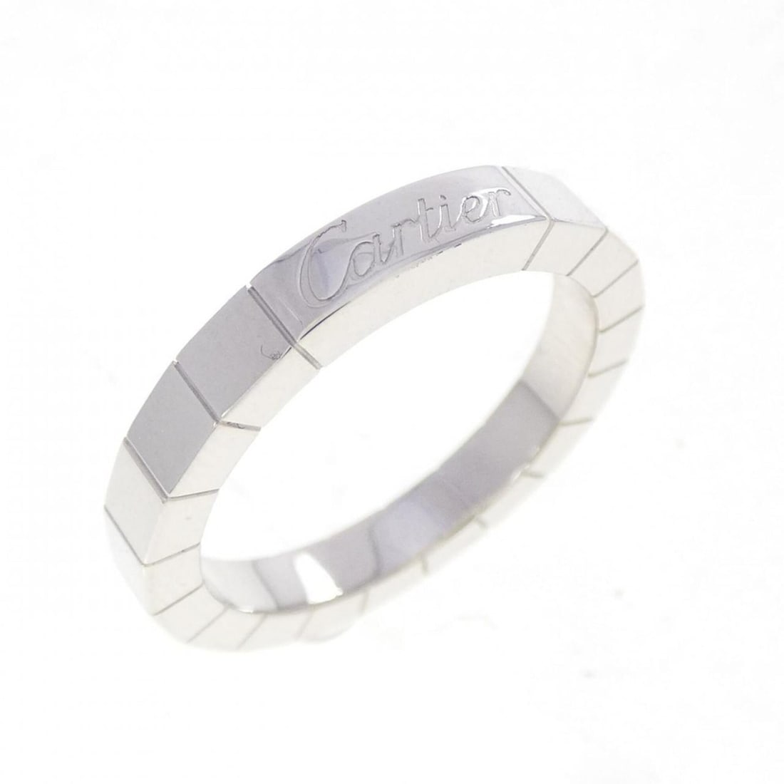 Cartier Lanieres Ring: --- Catalog ---Category: SizeUS Size: 5.5Brand Size: 50Category: DesignType: Band ringColor: White goldGender: WomenMaterial: White gold (18K)Category: GeneralMPN: B4045000Brand: Cartier--- Item List 